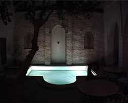 La piscine du riad le soir Maisons hôtes Marrakech Riad Amira
